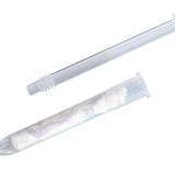 A clear plastic syringe-style applicator tube shown open with a minisponge pouch inside, photographed on a plain white background.